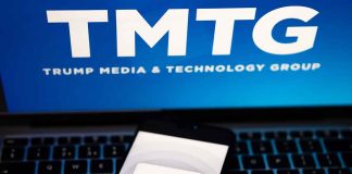 "TMTG and Truth Social logos on screen and phone."