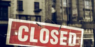 Closed sign in store window