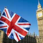 Union Jack flag with Big Ben in background.