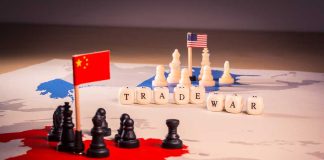 Trade war concept with chess pieces and flags