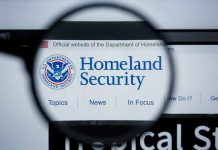 Magnifying glass showing Homeland Security website