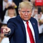 Trump pointing at rally audience