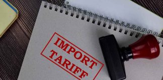 Notebook with Import Tariff stamp and rubber stamper