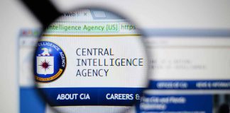 Magnifying glass over Central Intelligence Agency webpage