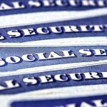Blue Social Security cards piled together