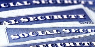 Blue Social Security cards piled together