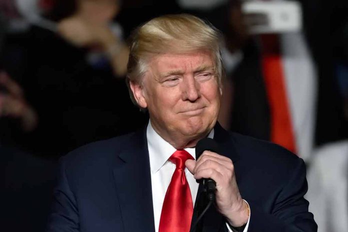 651225961 featured image Trump holding microphone wearing suit and red tie
