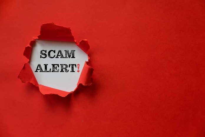 1906998922 featured image Red paper tear with the words scam alert