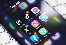Smartphone showing social media app icons in a folder