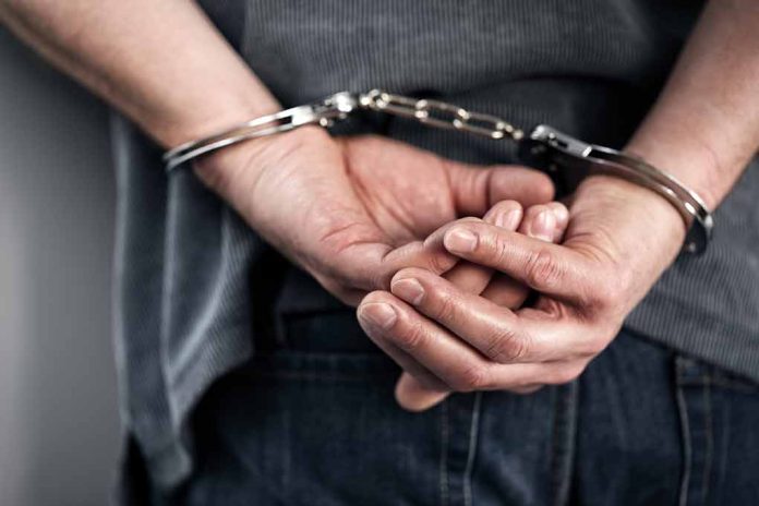 258602471 featured image Person in handcuffs with hands behind back