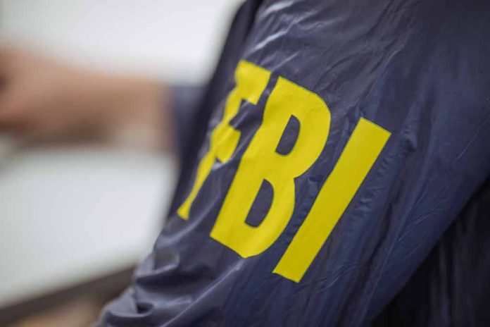 Person wearing jacket with FBI in yellow letters
