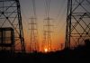 Transmission towers at sunset