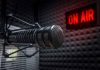 Microphone in studio with On Air sign