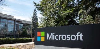 Microsoft sign with office buildings and trees