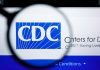 CDC logo magnified on a screen