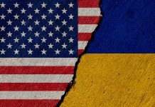 Torn United States and Ukraine flags