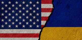 Torn United States and Ukraine flags