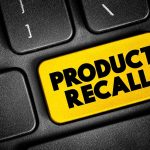 Black keyboard with Product Recall yellow key