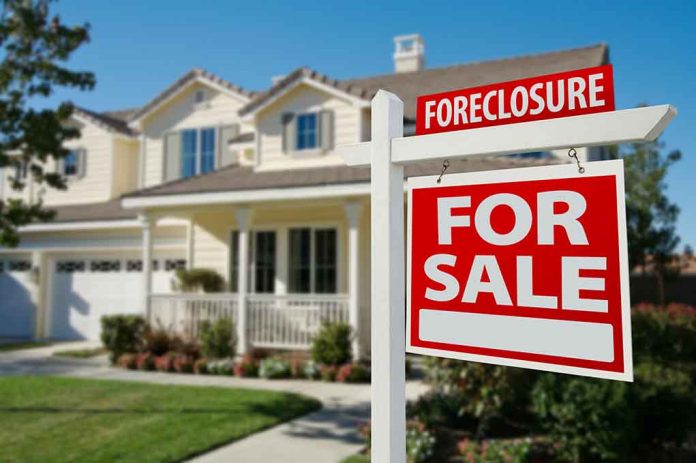 50097061 featured image House for sale with foreclosure sign