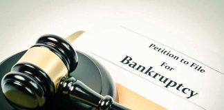 Gavel on bankruptcy petition document