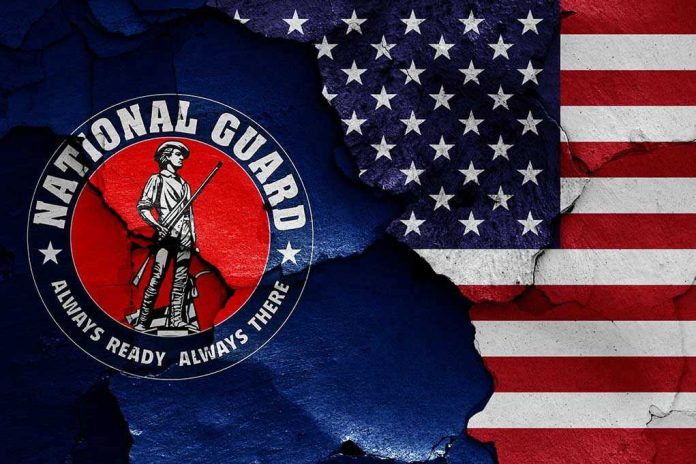 1787937674 National Guard logo over a distressed American flag