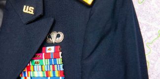 Military jacket with ribbons and badges displayed