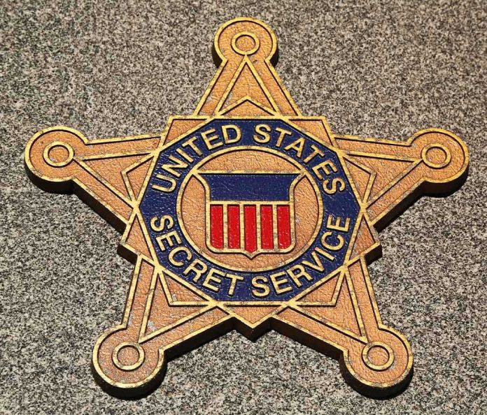 shutterstock_134990735.jpg Golden badge of the United States Secret Service displayed on a surface