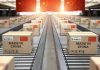 Boxes labeled Made in China on conveyor belt