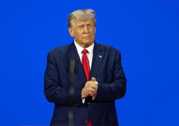2271370981 Man in a suit with a blue background.