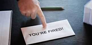 Envelope with YOU'RE FIRED and pointing finger.