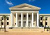 Exterior view of the Supreme Court of Florida with columns and palm trees